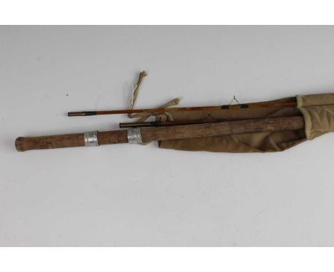 A vintage "The Orwell" 11' split cane three piece rod, in associated canvas bag.