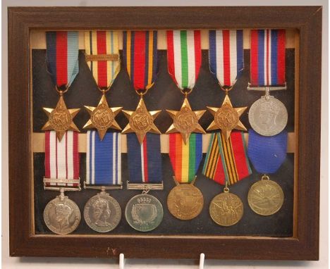 A group of twelve medals to include 1939-1945 Star, Africa Star with North Africa 1942-43 clasp, Burma Star, Italy Star, Fran