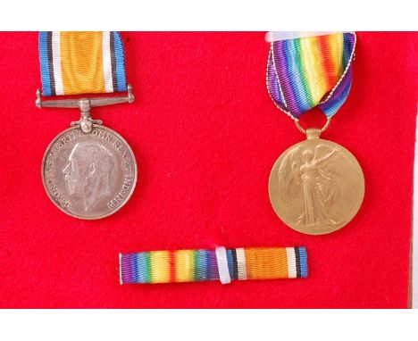 A WW I British War and Victory pair, naming 202738 PTE. J. HOPKINSON. E. LANC. R. (2)