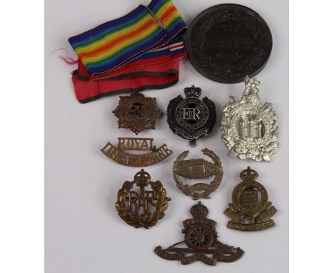 A collection of cap badges, shoulder titles and insignia to include Royal Engineers, RAF, Royal Army Ordnance Corps, Scottish