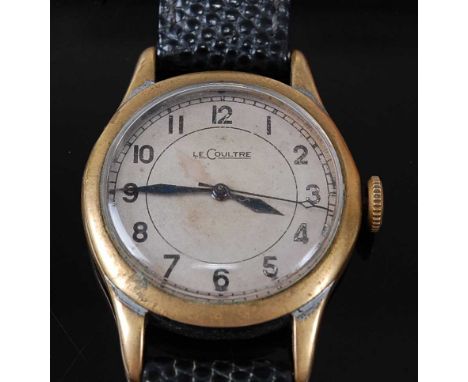 A Gentleman's Jaeger LeCoultre Military Issue Pilot/Navigators wristwatch, circa 1943, having a signed off-white dial with Ar