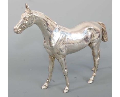 A contemporary Continental silver model of a horse, maker J.M.R., London import mark for 1968, h.20cm.