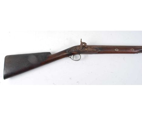 A 19th century percussion sporting gun, the 84cm barrel with gilt oval cartouche signed H. Nock London, the lock with further