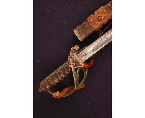 A British 1821 pattern Light Cavalry sword, the 83cm blade etched with a crowned GRV cypher, having a three bar hilt, wire bo