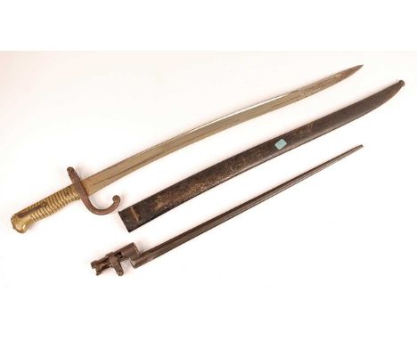 A French model 1866 Chassepot bayonet, having a 57cm Yataghan shaped fullered blade, hooked quillon and ribbed brass grip, ho