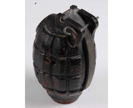 A deactivated Mills No. 36 Mk II hand grenade, the body marked K, the lever FB and the base plug SEG, h. 10cm