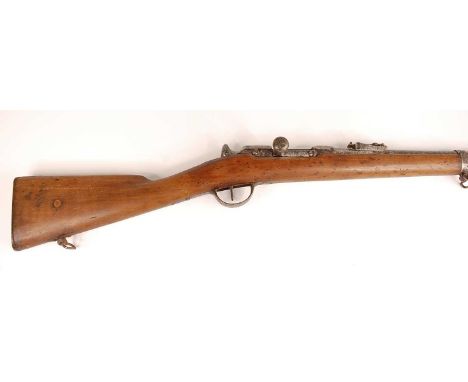 A French M1866 Chassepot 11mm bolt action rifle, the 79cm barrel with folding ladder sight marked MI S. 1869, the breech mark