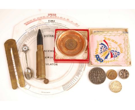 Acollection of miscellaneous items to include a small copper dish inset with a tug-of-war medal dated 1955, in F. Phillips of