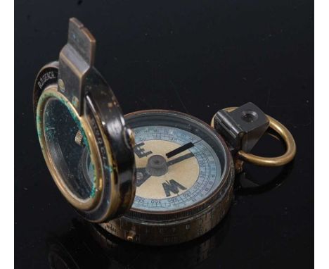 A WW I private purchase brass cased prismatic compass, engraved R.D. Geach 5TH D.C.L.I.