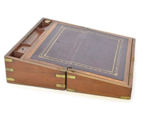 Mid-19th-century figured walnut veneered writing box banded in brass with vacant escutcheon and matching cartouche, interior 