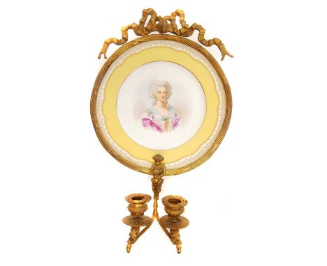 Sevres style ormolu mounted plate, with twin candle sconces, painted with a portrait of Marie Antoinette, mid 19th century. 4