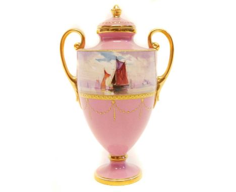 Minton lidded vase signed J.E. Dean, painted with barges and sailing ships within a jewelled gilt and pink ground, 18cm high 