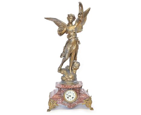 Mid-19th-century mantle clock, 8-day movement striking on a single bell, rouge marble case, pediment decorated with large Spe