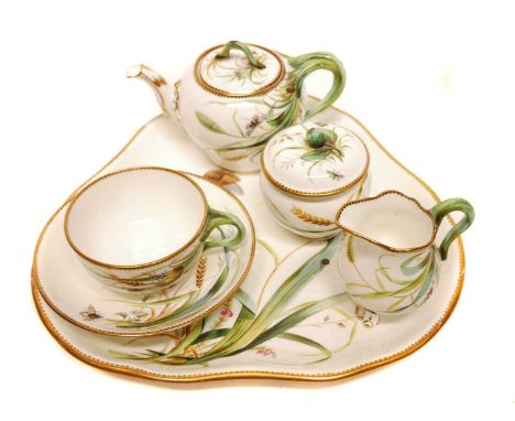 Minton Caberet set, painted with insects and wild grasses, to include teapot, cream jug, sucrier, and a cup and saucer, on tr