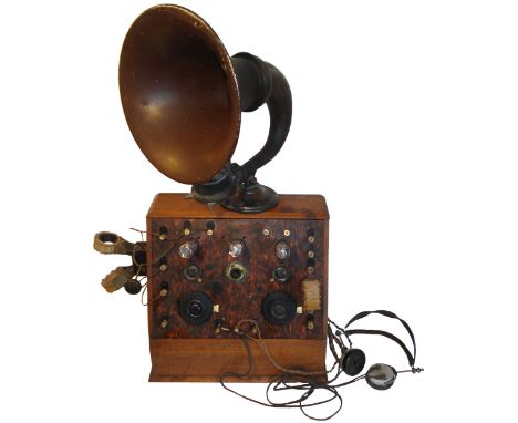 An early three-valve slope-front wireless receiver outfit,Circa 1923,Stilt-boss valve holders, twin tuning dials, fixed and m