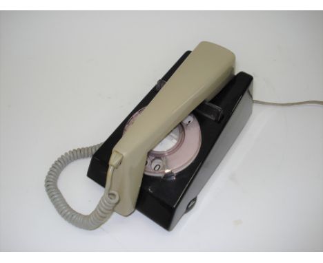 A good Snowden Special GPO Trimphone,Light grey/black combination, with full volume control wheel, wedge-form receiver.
