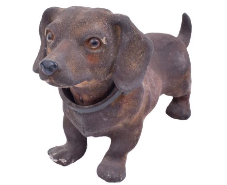 A small and cute nodding dog manual automaton,Probably French, circa 1910,Standing, now hardened plum-brown velvet covered pa