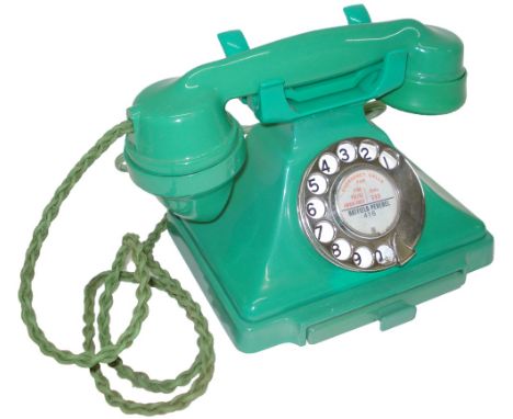 A very rare type 234 mid-war jade green Bakelite telephone,Impressed mark 164-44/1,with the matching green braids and exchang