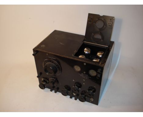 A Federal type 57 wireless receiver,USA, compact layout with 4 valve line-up, full stage controls on ebonite panel, in black 