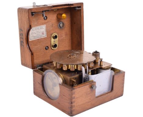 A pigeon-racing recording clock,Circa 1920, No. 79157,With keyed and secure recording movement, dial with typical twin subsid