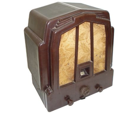 An Ekco type RS2 AC wireless receiver,1931 – the ‘Odeon’ set,TRF chassis in architectural brown Bakelite case, lacking back p