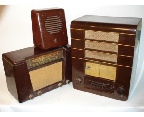Bakelite cased wireless receivers:An Ekco type A21; a Philips type BG414A; and a slope-front extension speaker, all in mottle