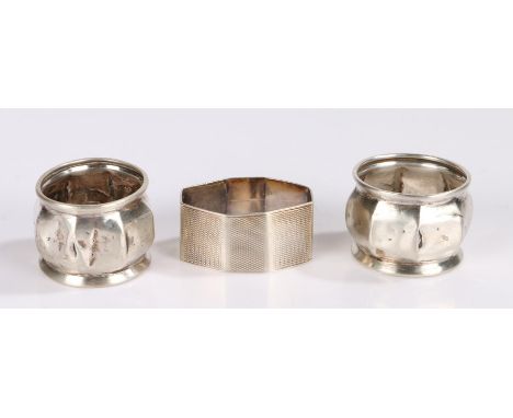 Pair of George V silver napkin rings, Birmingham 1927, maker Docker &amp; Burn Ltd. of bulbous octagonal form, George VI silv