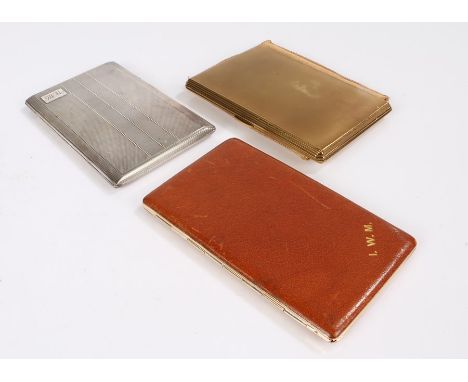 Silver plated cigarette case, the engine turned exterior with rectangular cartouche initialled JWM, Cross leather mounted gil