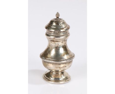 Edward VII silver pepperette, Birmingham 1905, makers mark rubbed, with twisted finial above the baluster body and waisted fo