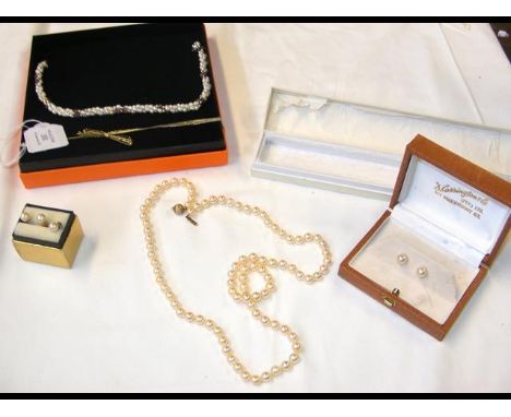 Pearl necklaces, earrings, etc. 