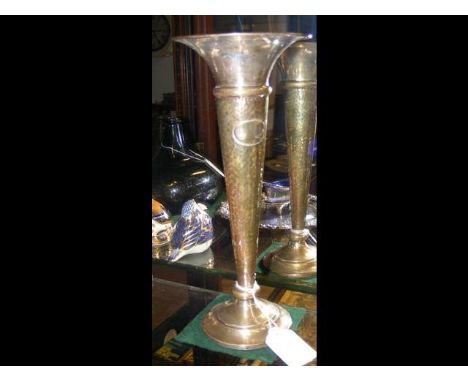 A silver trumpet vase - 27cm high 