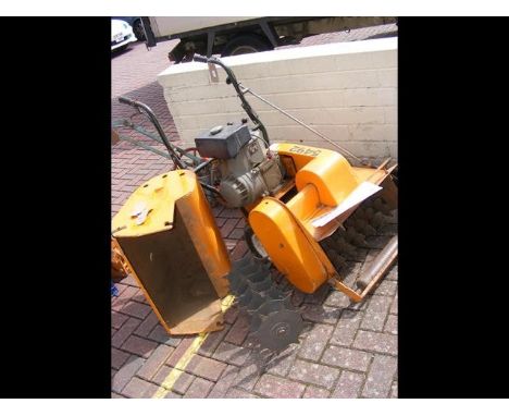 A petrol driven auto-rotorake with manual and spare rake