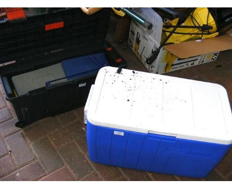 A box of tools together with a cool box