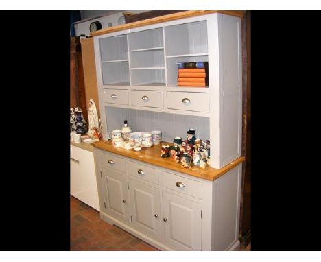 A taupe painted kitchen dresser with light oak top, having compartments and small drawers to top - width 138cms, height 190cm