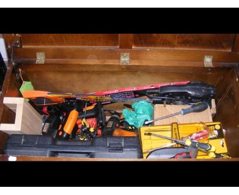 A chest of various tools including cordless drill and saws etc