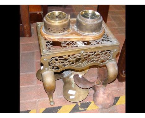 A ships clock and barometer, Victorian brass footman together with two bronze propellers