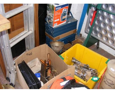 A large collection of tools including spanners, submersible water pump, folding toolboxes etc