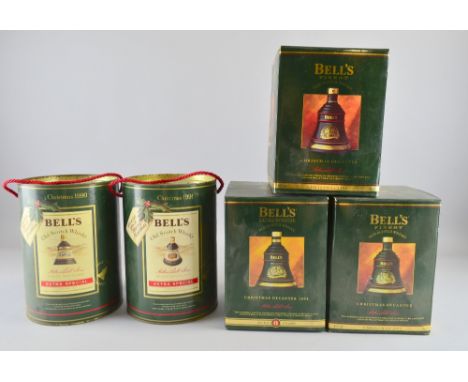Five Christmas Bell's Whisky ceramic decanters 1990,1991.1992.1993,1994 