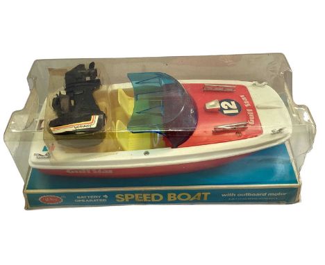 Redbox battery operated Gulf Star model speed boat, with Johnson outbroad motor, on plinth with bubblepack (1)