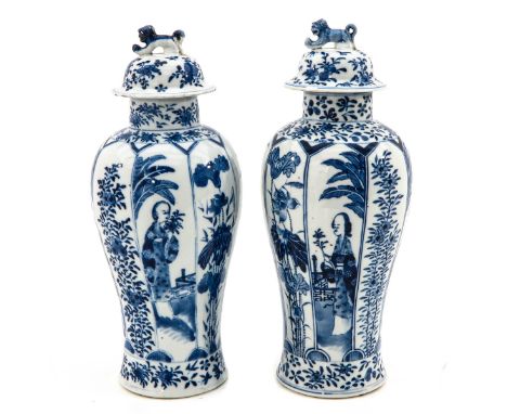 Decorated with alternating scenes of Chiinese ladies and flowers, Kangxi mark, 33 cm. tall, chip and hairline.
