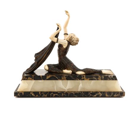 Bronze on onyx base, with sculpture of an Egyptian Dancer, signed Charles, with lighting, length 42 cm. This lot will not be 