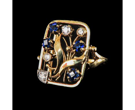 14k gold set with 4 brilliant cut diamonds and 4 sapphires, ring size 16