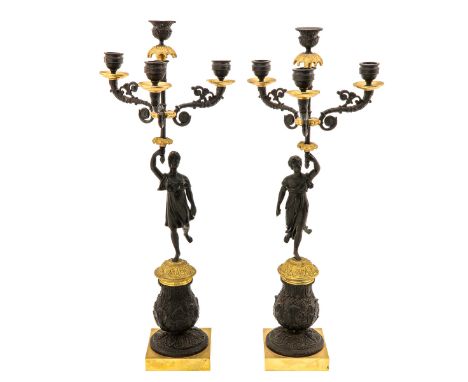 4 lights, blackened bronze with gilded parts, depicting women, height 53 cm.