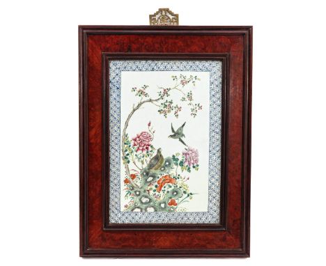 Depicting Flowers and birds in Famille Rose enamels, tile measures 29 x 42 cm.