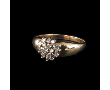 14k gold, set with 19 brilliant cut diamonds, ring size 18