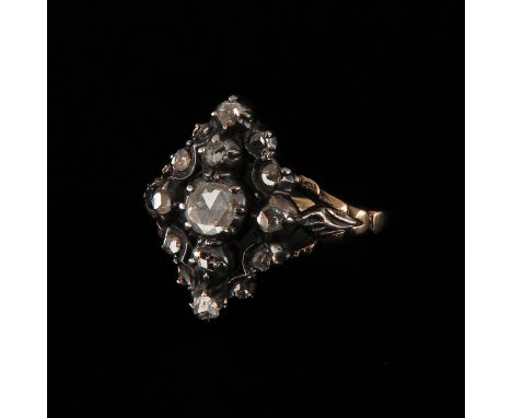 Circa 1930, set with 15 rose cut diamonds, largest diameter 3 mm, ring size 19