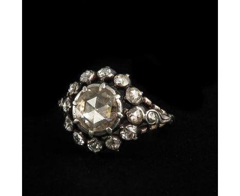 19th century, gold on silver, set with 15 rose cut diamonds, largest diameter 7.5 mm. ring size 16