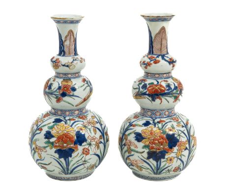 Kangxi Period, floral decor, 32 cm. tall, restoration on rim.