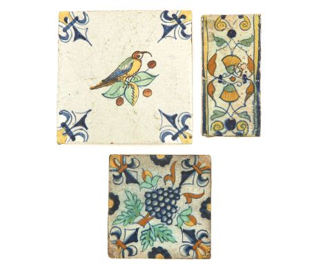 Consisting of 3 tiles, including a 17th century polychrome bunch of grapes tile, 11 x 11 cm.