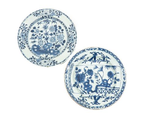 Including scroll plate and plate decorated with flowers and Chinese antiquities, 18th Century, 28 cm. in diameter, fritting.